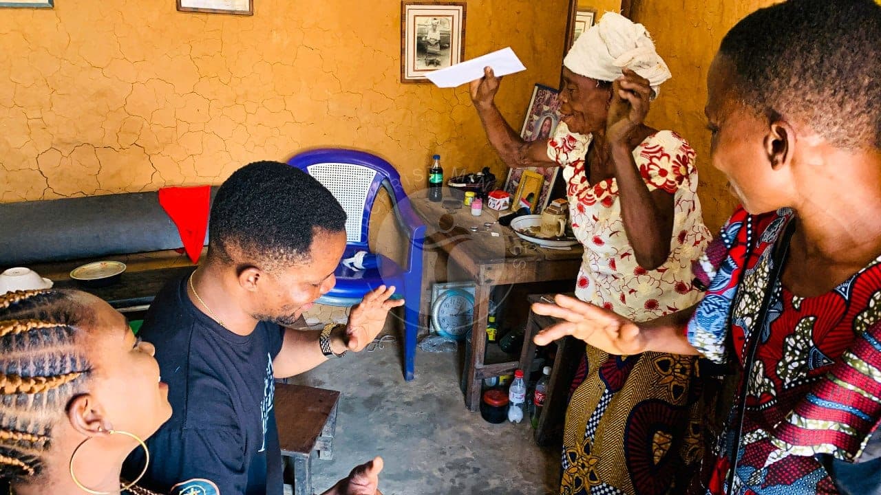 Rejoicing together during a home visit.